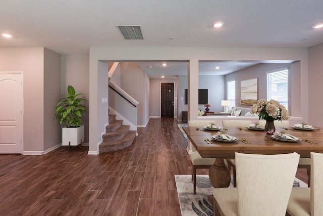4219 Mossy Banks Ln, Houston, TX 77068 - dining space featuring wood finished floors, stairway, recessed lighting, and baseboards
