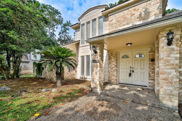 14211 Lakewood Forest Dr, Houston, TX 77070 - property entrance featuring brick siding