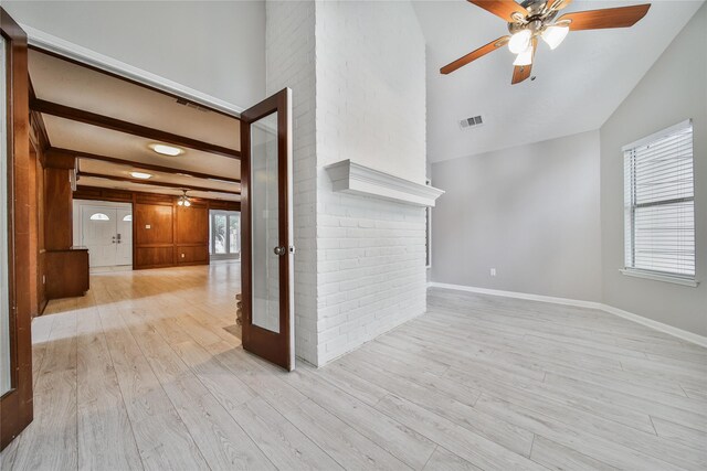 14211 Lakewood Forest Dr, Houston, TX 77070 - unfurnished room with high vaulted ceiling, a ceiling fan, baseboards, light wood-type flooring, and visible vents