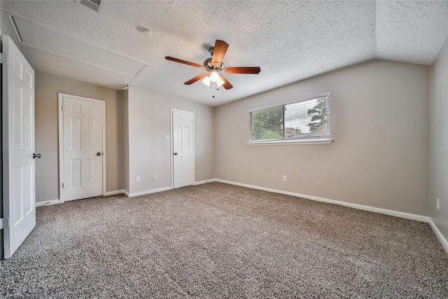 14211 Lakewood Forest Dr, Houston, TX 77070 - unfurnished bedroom featuring baseboards, carpet, attic access, and a textured ceiling