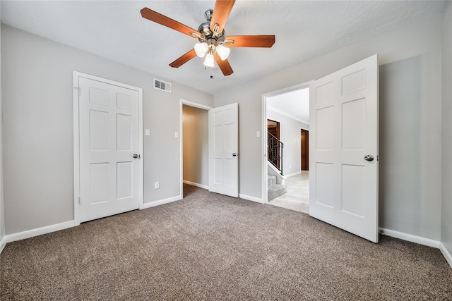 14211 Lakewood Forest Dr, Houston, TX 77070 - unfurnished bedroom featuring visible vents, baseboards, and carpet floors