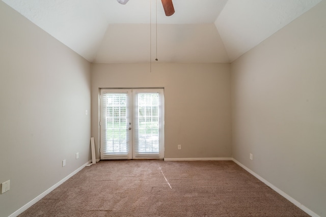 18927 Sandia Pines Dr, Humble, TX 77346 - spare room with light carpet, ceiling fan, lofted ceiling, baseboards, and french doors
