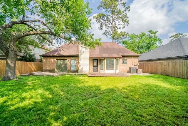 18927 Sandia Pines Dr, Humble, TX 77346 - rear view of property featuring a patio area and brick siding