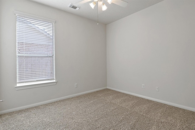 2126 Fortuna Bella Dr, Pearland, TX 77581 - unfurnished room with carpet floors, baseboards, ceiling fan, and visible vents