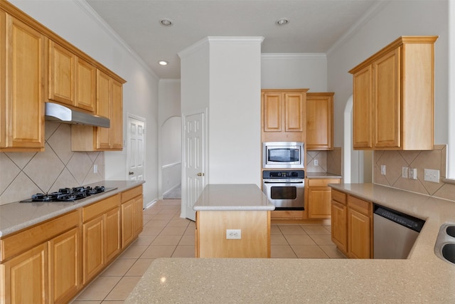 2126 Fortuna Bella Dr, Pearland, TX 77581 - kitchen with light countertops, stainless steel appliances, light tile patterned flooring, and under cabinet range hood