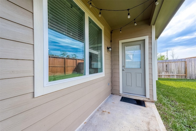 property entrance featuring fence