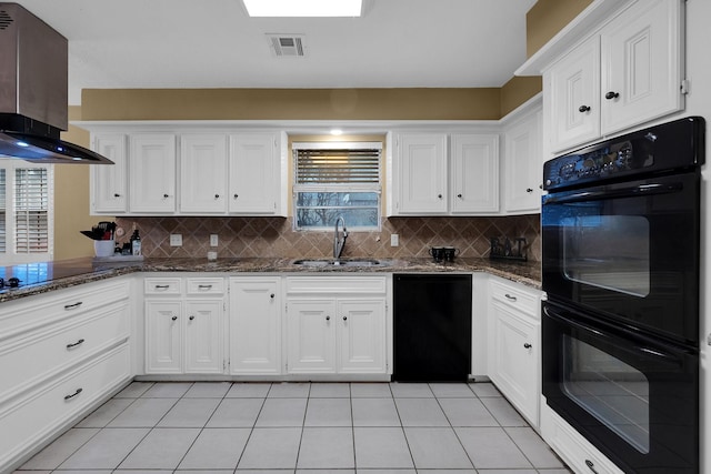 kitchen featuring exhaust hood, visible vents, a sink, black appliances, and white cabinetry