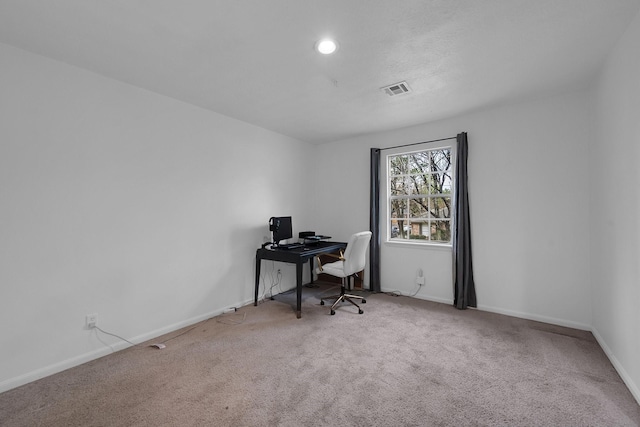 carpeted office space with visible vents, recessed lighting, and baseboards