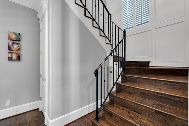 358 W 26th St, Houston, TX 77008 - stairway featuring baseboards and wood finished floors