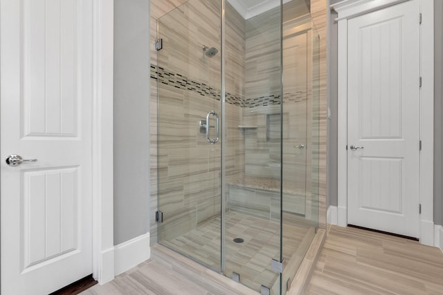 358 W 26th St, Houston, TX 77008 - bathroom featuring baseboards and a shower stall