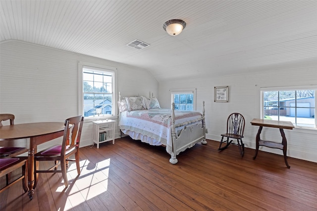 bedroom with wooden ceiling, visible vents, hardwood / wood-style flooring, and lofted ceiling