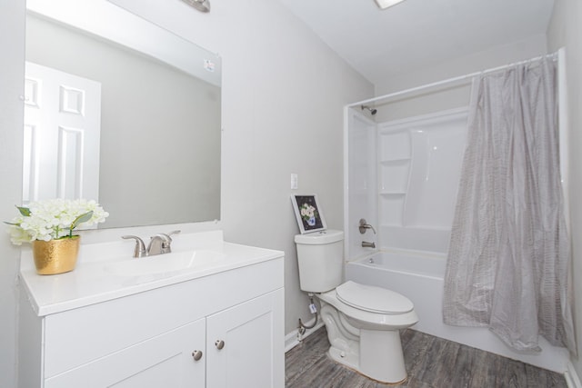 bathroom with vanity, shower / bathtub combination with curtain, wood finished floors, and toilet