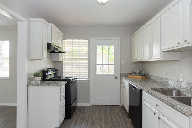 kitchen featuring under cabinet range hood, white cabinets, dark wood-style floors, and black appliances