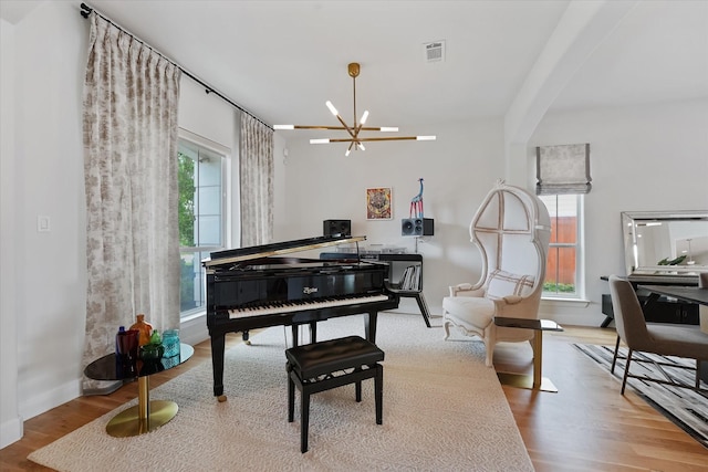 919 Worthshire St, Houston, TX 77008 - sitting room with a chandelier and wood finished floors