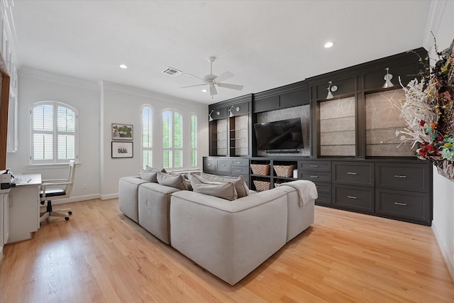 919 Worthshire St, Houston, TX 77008 - living area with crown molding, baseboards, a ceiling fan, light wood-style flooring, and an office area