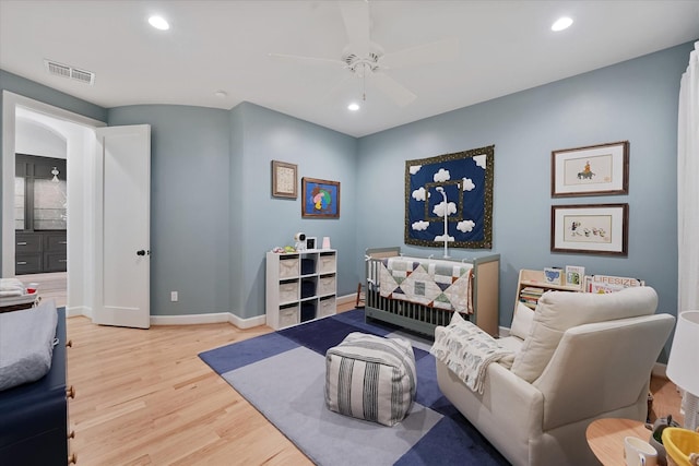 919 Worthshire St, Houston, TX 77008 - living room featuring wood finished floors, baseboards, a ceiling fan, and recessed lighting