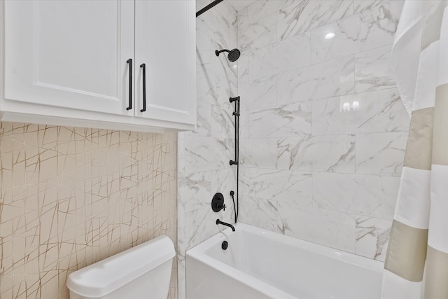 919 Worthshire St, Houston, TX 77008 - bathroom featuring washtub / shower combination, toilet, and tile walls