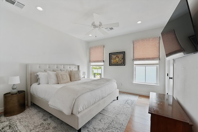 919 Worthshire St, Houston, TX 77008 - bedroom with recessed lighting, light wood-style flooring, baseboards, and ceiling fan
