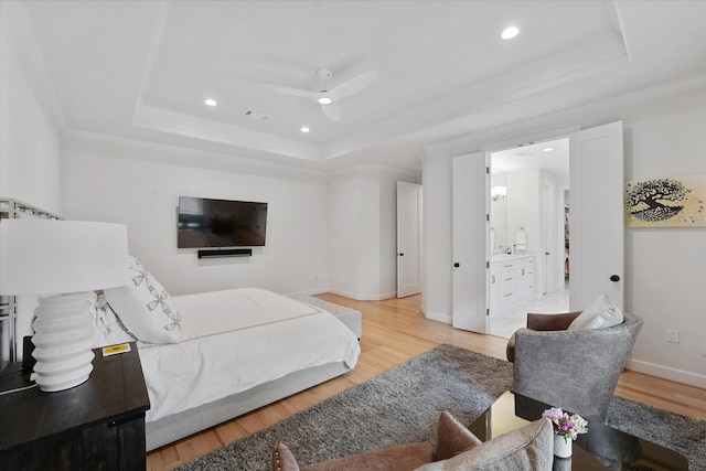 919 Worthshire St, Houston, TX 77008 - bedroom featuring a tray ceiling, wood finished floors, recessed lighting, crown molding, and baseboards