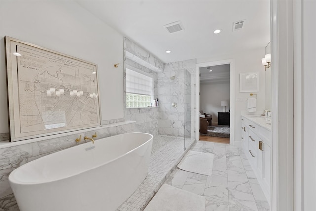 919 Worthshire St, Houston, TX 77008 - full bathroom featuring marble finish floors, a tile shower, a freestanding tub, ensuite bath, and recessed lighting