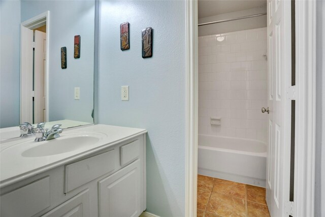 full bathroom with shower / washtub combination, tile patterned flooring, and vanity