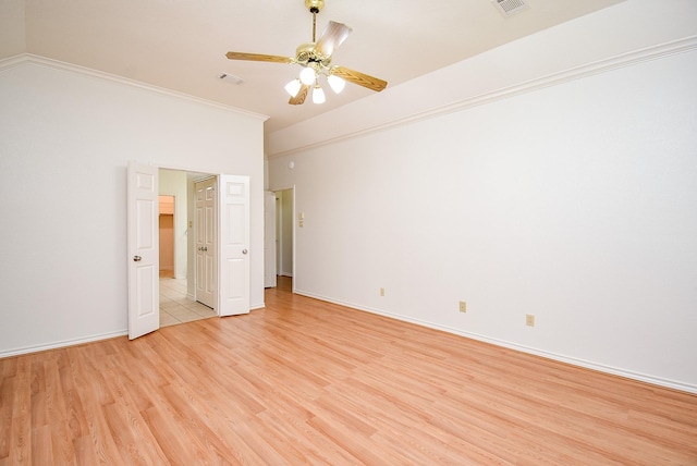 6007 Gideon Ct, Sugar Land, TX 77479 - spare room with a ceiling fan, visible vents, baseboards, light wood-style floors, and ornamental molding