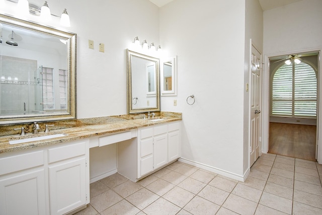 6007 Gideon Ct, Sugar Land, TX 77479 - full bath featuring double vanity, a sink, a stall shower, and tile patterned floors