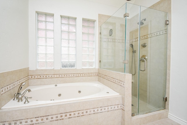 6007 Gideon Ct, Sugar Land, TX 77479 - full bath with a tub with jets, a stall shower, and a wealth of natural light