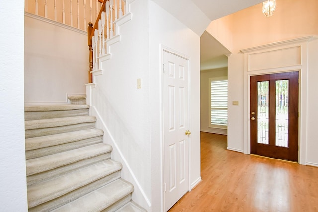6007 Gideon Ct, Sugar Land, TX 77479 - foyer with light wood-style flooring and stairway