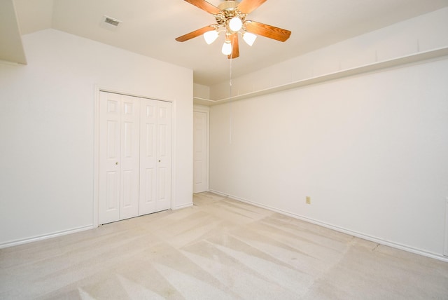 6007 Gideon Ct, Sugar Land, TX 77479 - unfurnished bedroom featuring visible vents, a closet, light carpet, a ceiling fan, and vaulted ceiling