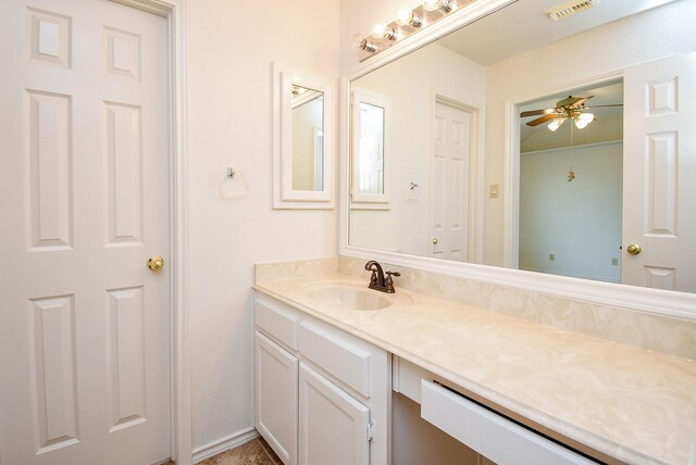 bathroom featuring visible vents, ceiling fan, and vanity