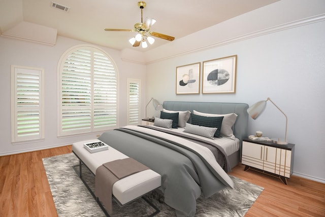 6007 Gideon Ct, Sugar Land, TX 77479 - bedroom with visible vents, ceiling fan, and wood finished floors