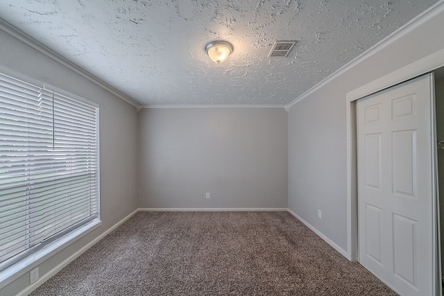 20211 Big Timber Ct, Humble, TX 77346 - unfurnished bedroom featuring carpet, a textured ceiling, baseboards, and crown molding