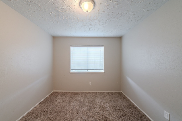 20211 Big Timber Ct, Humble, TX 77346 - carpeted empty room with baseboards and a textured ceiling