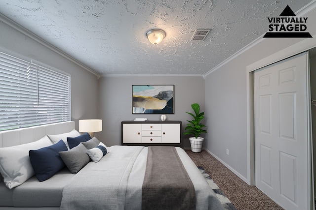 20211 Big Timber Ct, Humble, TX 77346 - carpeted bedroom with a textured ceiling, crown molding, and baseboards