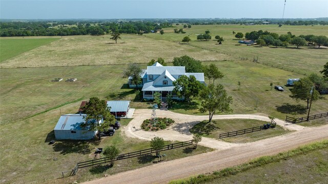 birds eye view of property featuring a rural view
