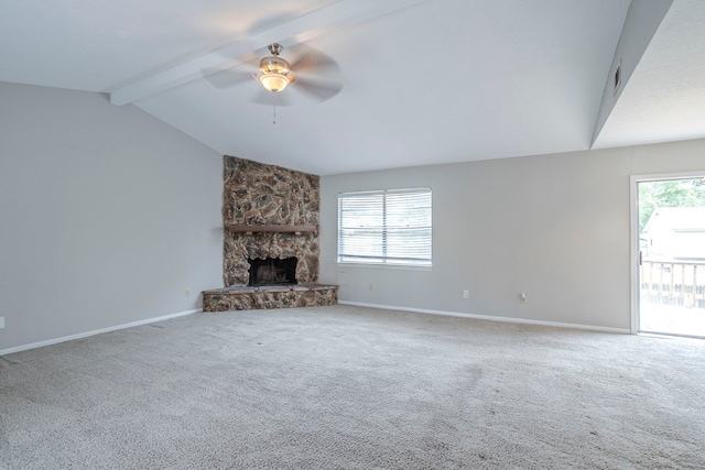 unfurnished living room featuring a healthy amount of sunlight, carpet floors, and ceiling fan