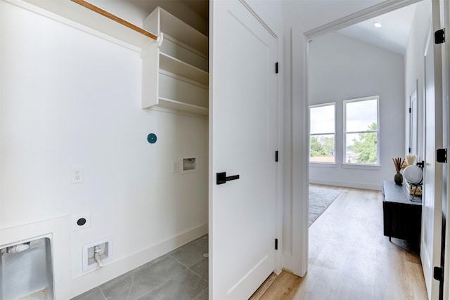 laundry area with washer hookup, hookup for an electric dryer, and baseboards