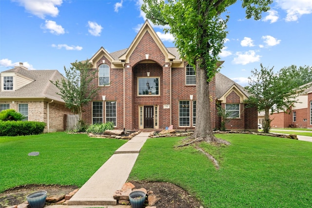 3714 Cedar Glen Ln, Spring, TX 77388 - view of front facade featuring brick siding and a front yard