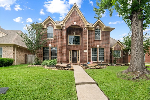 3714 Cedar Glen Ln, Spring, TX 77388 - traditional-style house featuring brick siding and a front yard