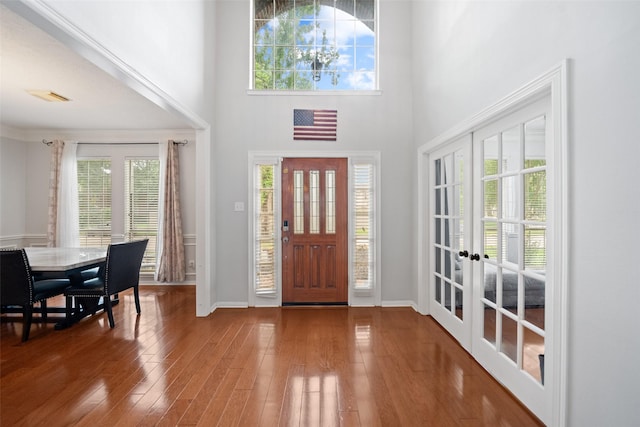 3714 Cedar Glen Ln, Spring, TX 77388 - entrance foyer with a towering ceiling, french doors, wood finished floors, and baseboards