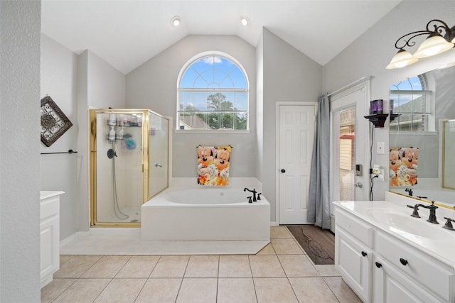 3714 Cedar Glen Ln, Spring, TX 77388 - full bath featuring a shower stall, lofted ceiling, a garden tub, vanity, and tile patterned floors