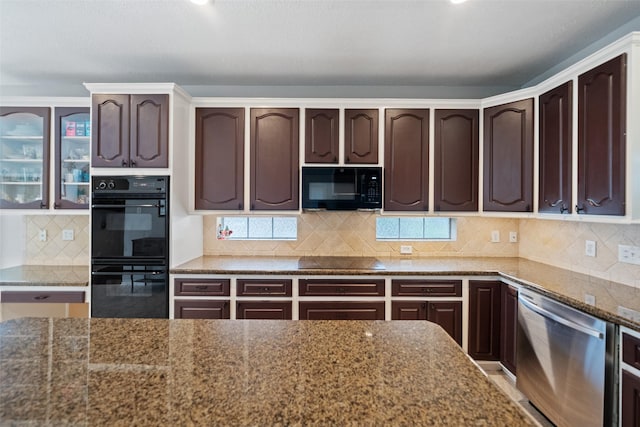 3714 Cedar Glen Ln, Spring, TX 77388 - kitchen with black appliances, dark brown cabinetry, decorative backsplash, and dark stone countertops