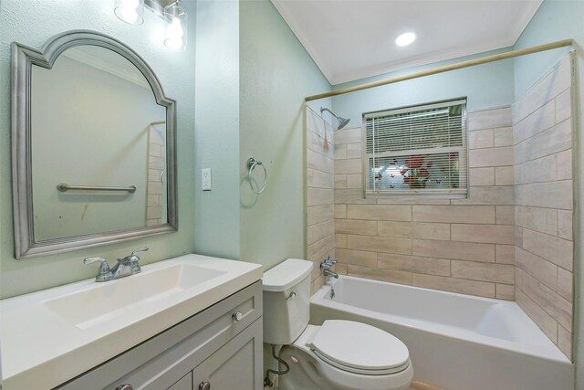 full bath featuring toilet, shower / washtub combination, ornamental molding, and vanity