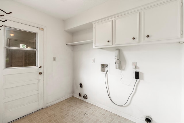 605 N Rivershire Dr, Conroe, TX 77304 - washroom featuring gas dryer hookup, baseboards, hookup for a washing machine, and cabinet space