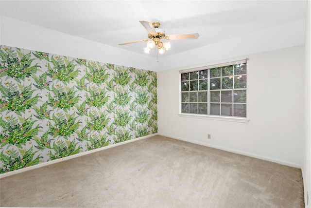 605 N Rivershire Dr, Conroe, TX 77304 - empty room with carpet flooring, a ceiling fan, and baseboards