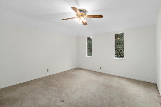 605 N Rivershire Dr, Conroe, TX 77304 - carpeted spare room with baseboards and a ceiling fan