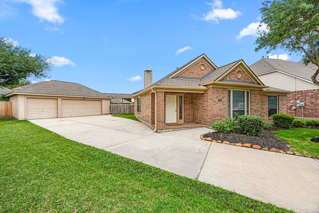 ranch-style home with brick siding, fence, a chimney, and a front lawn