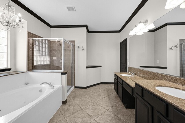 full bathroom featuring a sink, tile patterned flooring, a stall shower, and visible vents