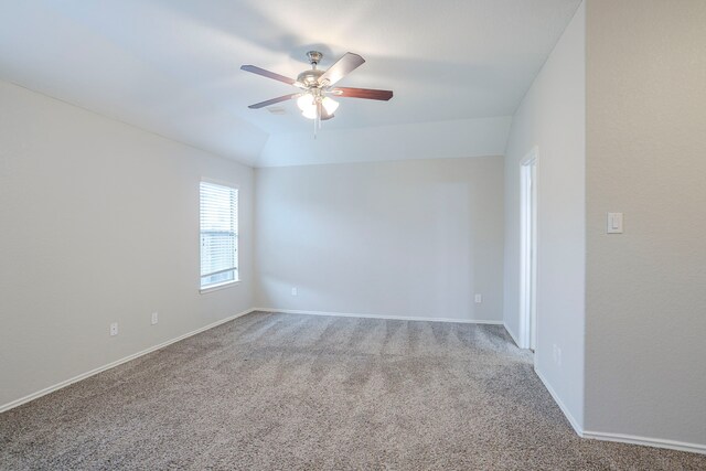15459 Refugio Verde Way, Houston, TX 77049 - empty room with baseboards, carpet flooring, ceiling fan, and vaulted ceiling